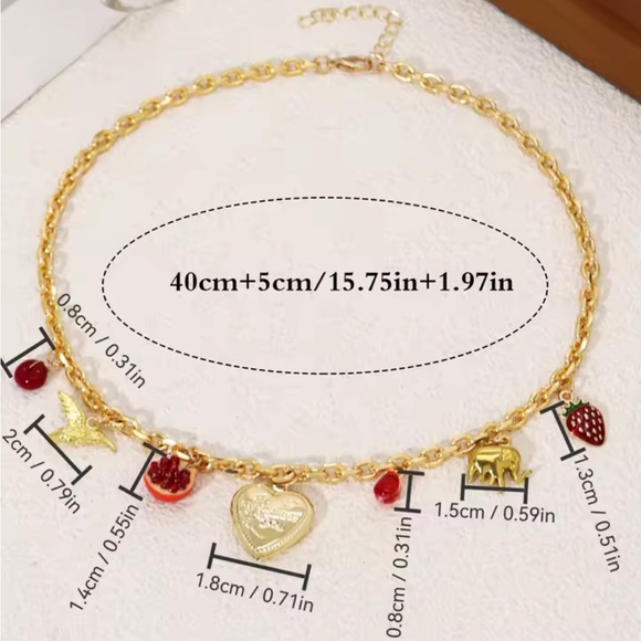 Stainless Charm Necklace with cherry, strawberry, elephant heart hummingbird - Picture 3 of 9